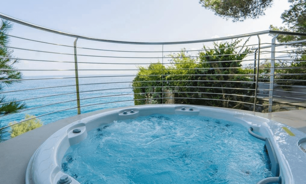 Villa Hotel Alassio in Alassio, Ligurian Riviera, Italy – serene poolside lounge area with sunbeds and umbrellas against Mediterranean backdrop