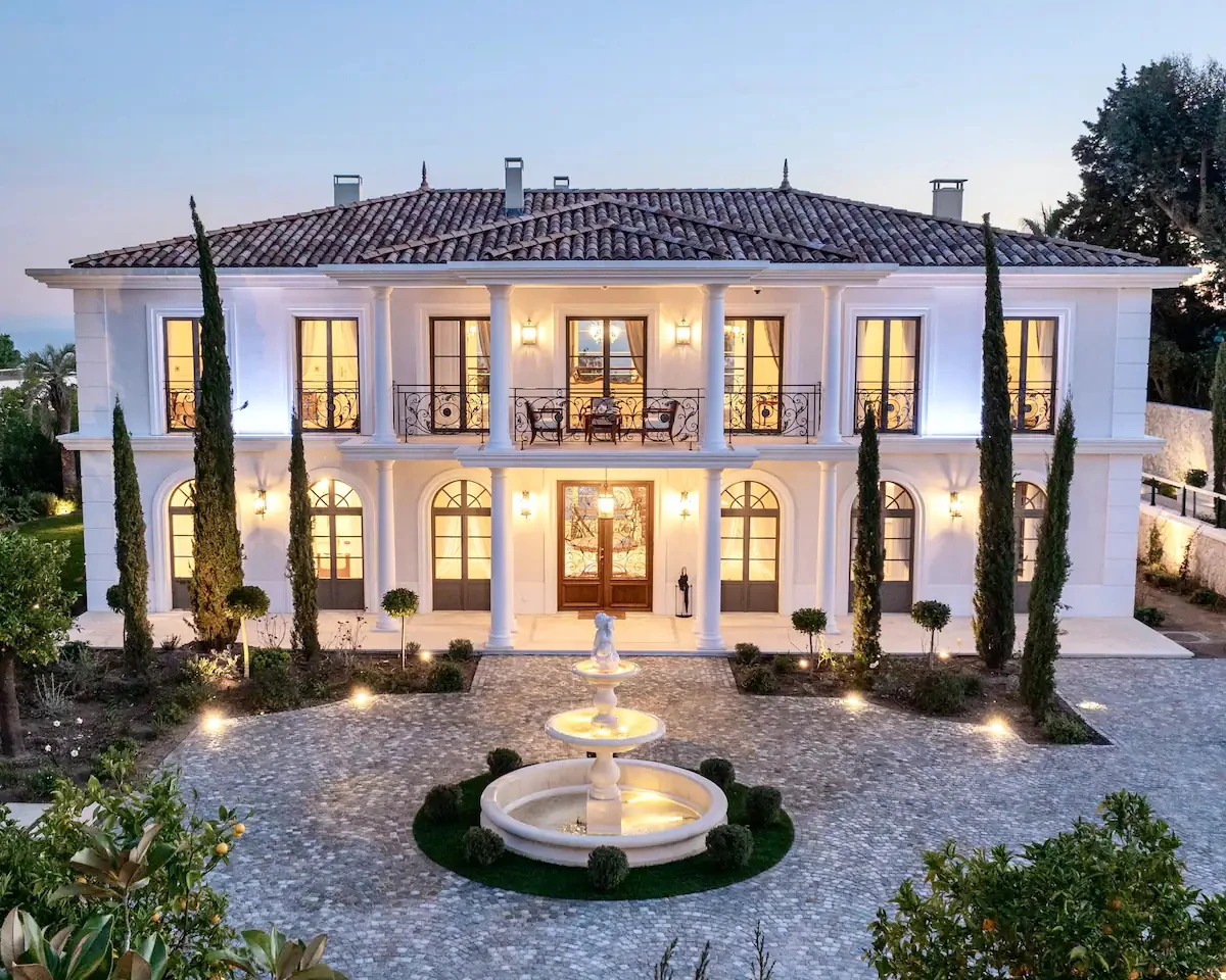 Aerial exterior view of Villa Hotel Brougham in Cannes, French Riviera, France – historic Belle Époque mansion nestled in a lush private garden
