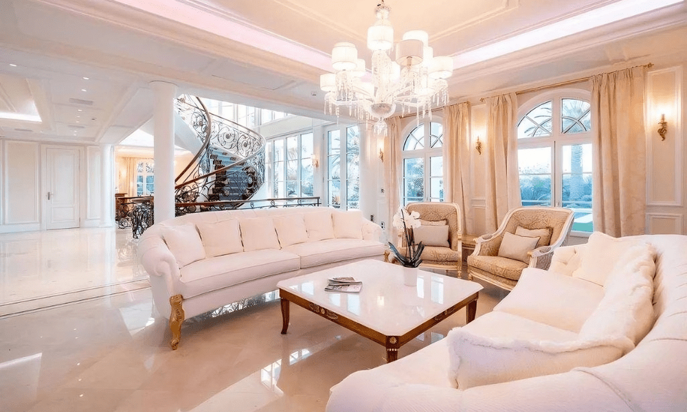 Master suite at Villa Hotel Brougham in Cannes, French Riviera, France – elegant bedroom with king-size bed and private balcony sea view