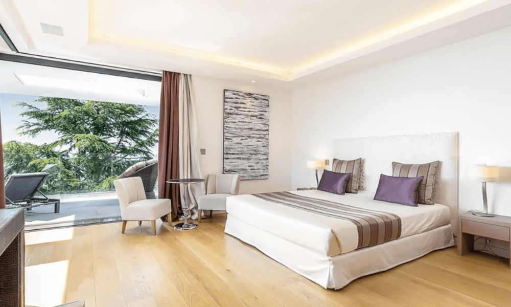 Villa Hotel Californie in Cannes, French Riviera, France – stylish living area with plush sofas and floor-to-ceiling windows