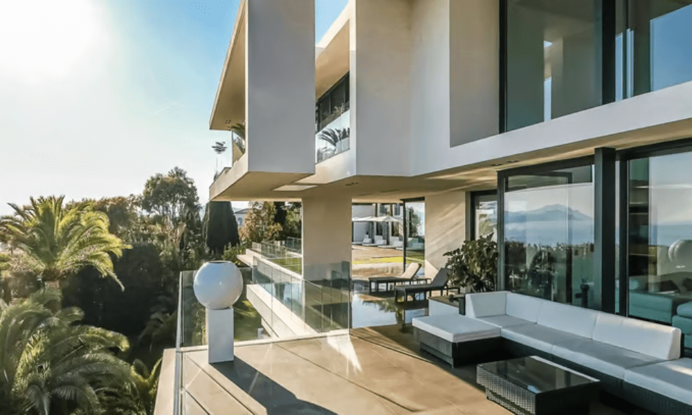 Villa Hotel Californie in Cannes, French Riviera, France – luxurious guest suite with king-size bed and sea-view balcony