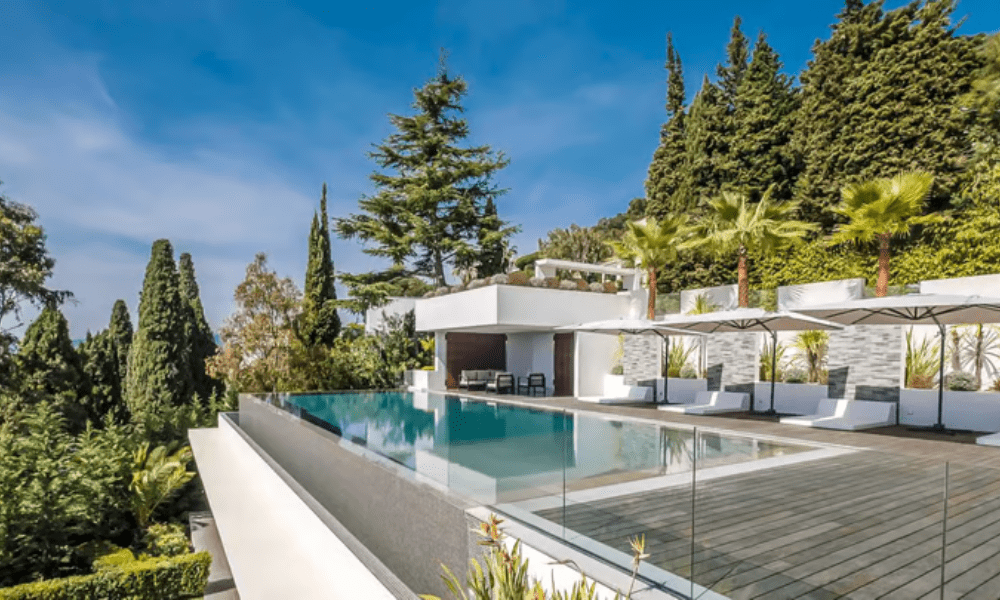Villa Hotel Californie in Cannes, French Riviera, France – stylish living area with plush sofas and floor-to-ceiling windows