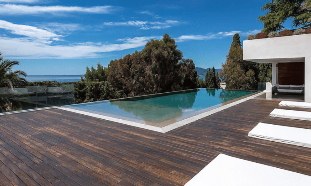 Villa Hotel Californie in Cannes, French Riviera, France – bar lounge with sleek countertop and illuminated wine display