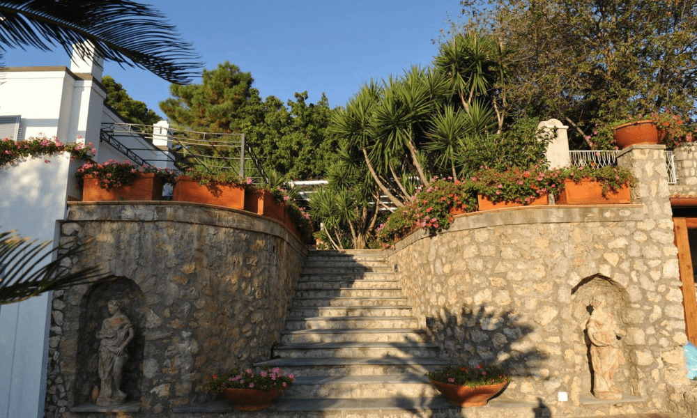 Villa Hotel Anacapri in Capri, Italy – aerial exterior view of the sunlit cliff-side villa overlooking the Gulf of Naples