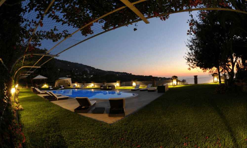 Villa Hotel Anacapri in Capri, Italy – stylish living room with plush sofas and floor-to-ceiling sea-view windows