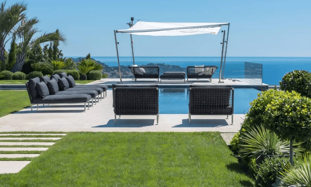 Villa Hotel Bertaud in Grimaud, French Riviera, France – infinity pool terrace with sun loungers overlooking the rolling Provençal hills