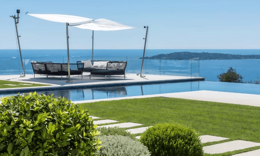 Villa Hotel Bertaud in Grimaud, French Riviera, France – sunset silhouette of the villa’s façade against a lavender field backdrop