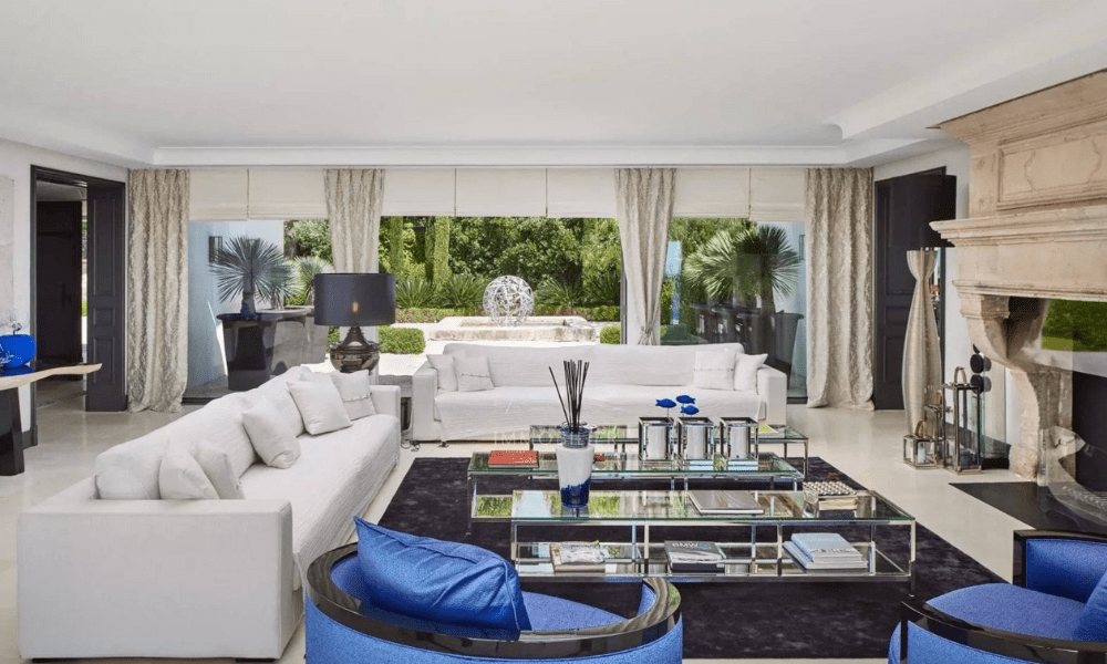 Villa Hotel Bertaud in Grimaud, French Riviera, France – sophisticated bar lounge with backlit spirits shelves and leather stools