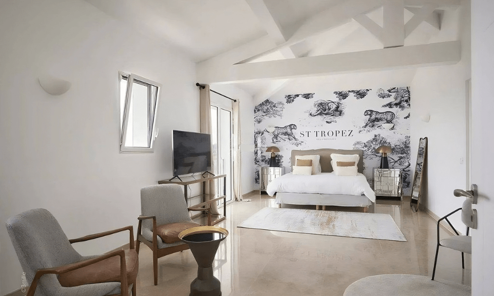 Villa Hotel Grimaud in Grimaud, French Riviera, France – intimate bar lounge with backlit spirits display and leather stools