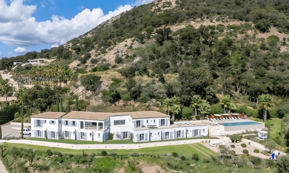 Villa Hotel Grimaud in Grimaud, French Riviera, France – aerial exterior view of the Provençal stone manor surrounded by lavender fields