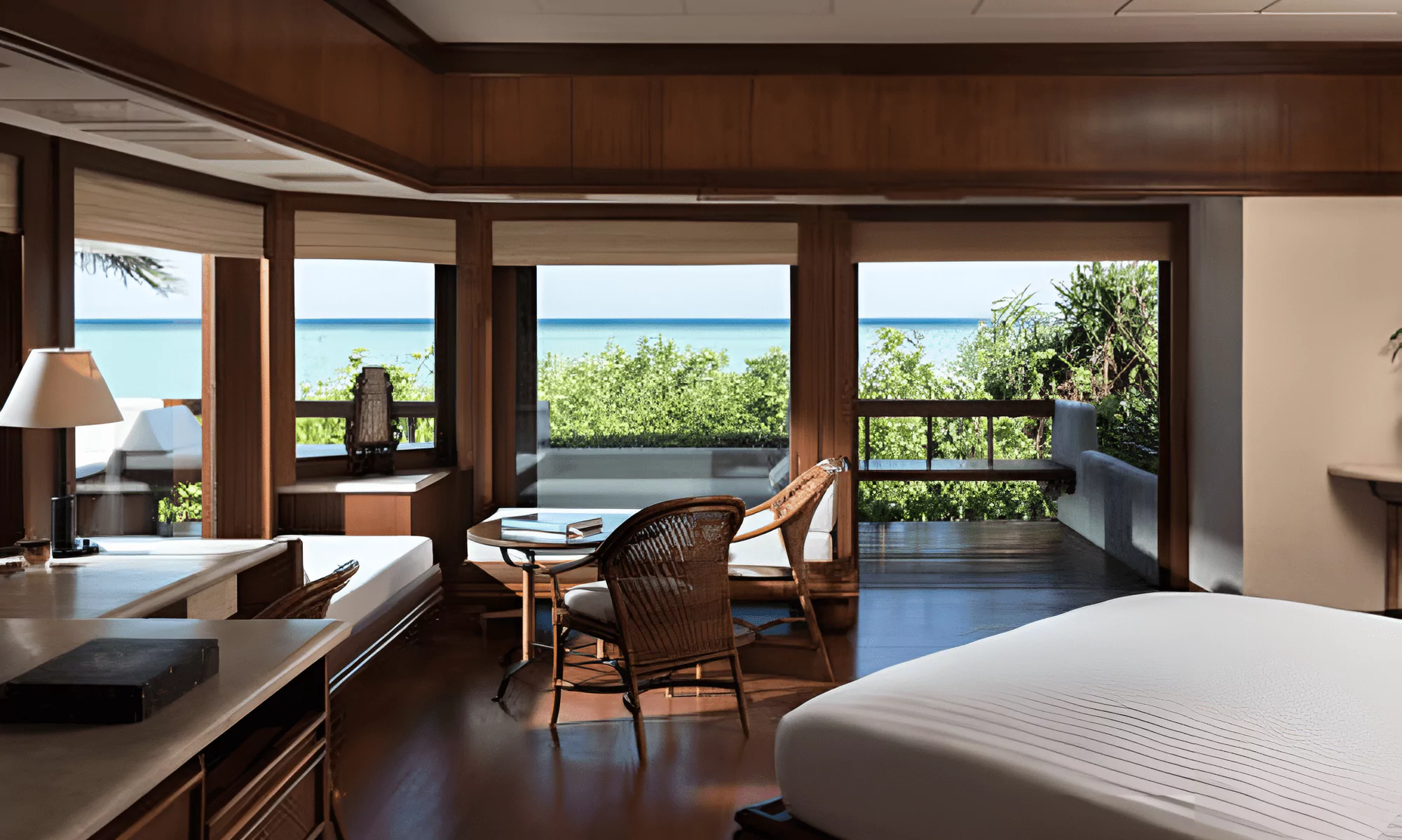 Luxury suite bedroom with views of the Indian Ocean, terrace with private pool.