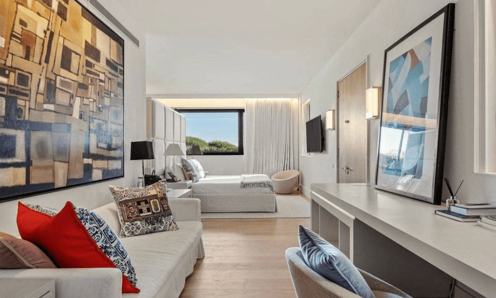 Majestic villa entrance with coastal backdrop