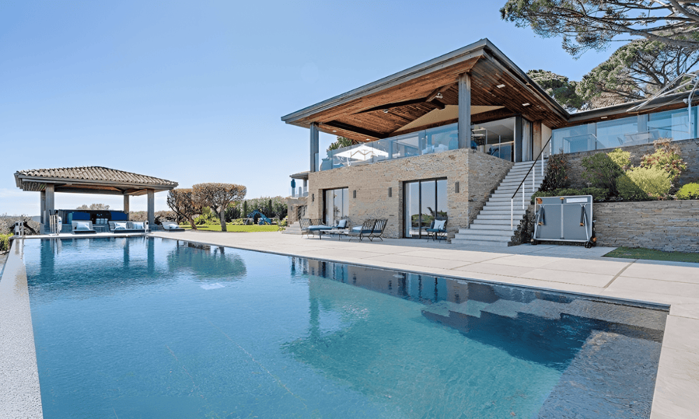 Designer dining space with ocean backdrop