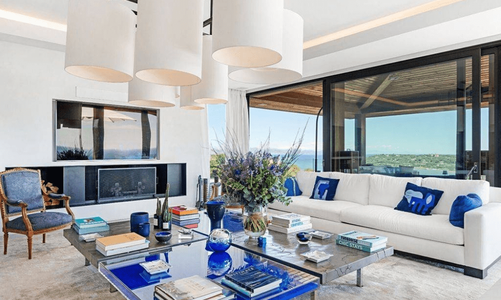Gourmet kitchen interior with natural light and sea scenery
