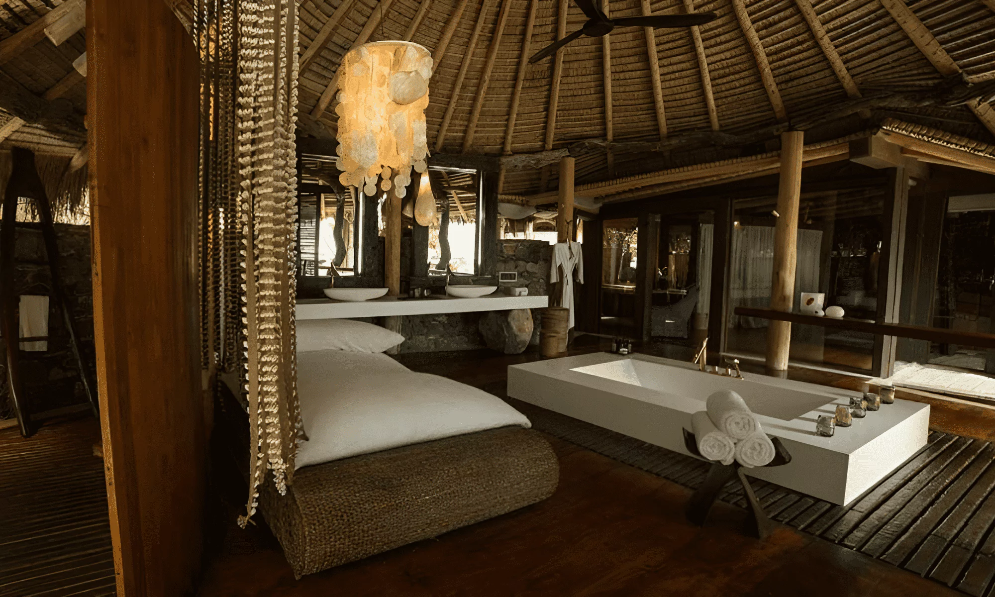 Luxury suite in the Seychelles with a modern design bathtub in the bathroom.