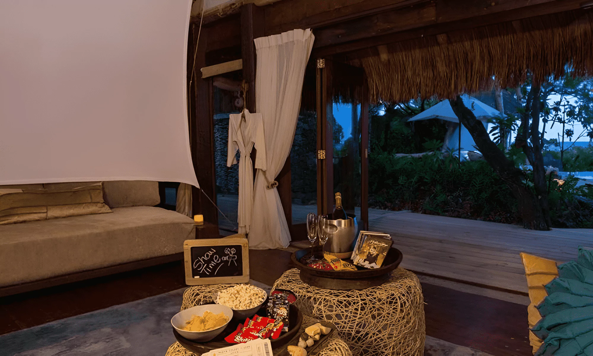 Luxury suite living room with champagne on a private island in the Seychelles.