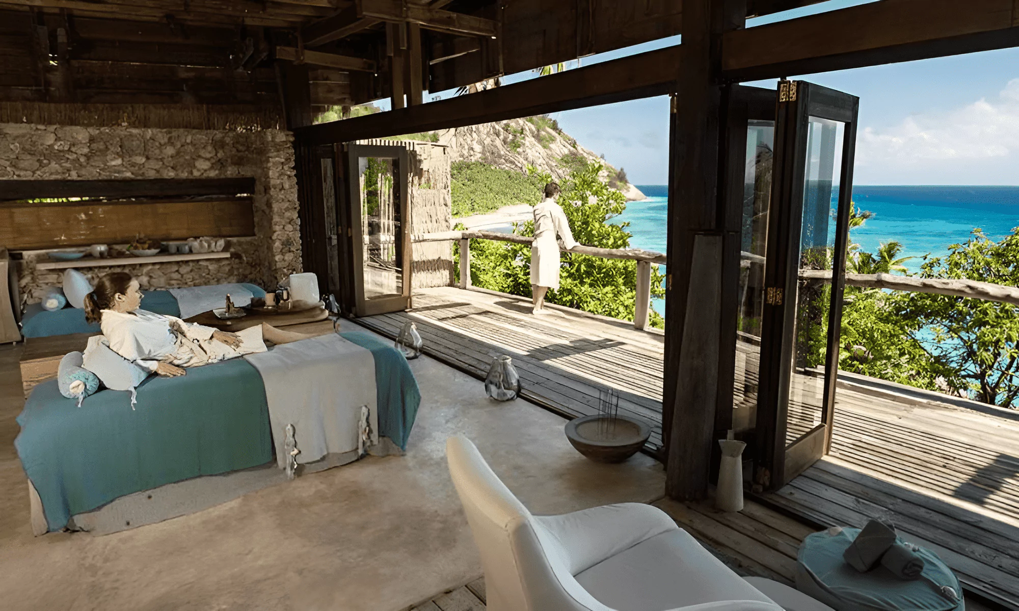 View of the ocean from the living room of the luxury suite through the terrace.