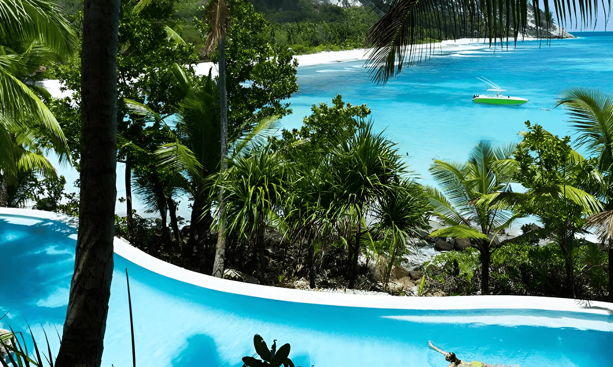 Infinity pool overlooking the turquoise lagoon in Seychelles.