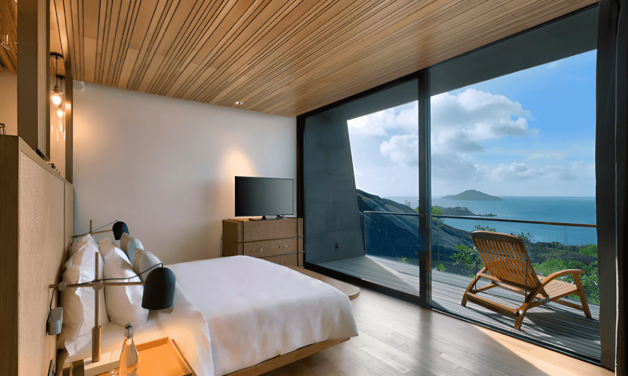 Luxury bedroom with ocean view from the terrace.