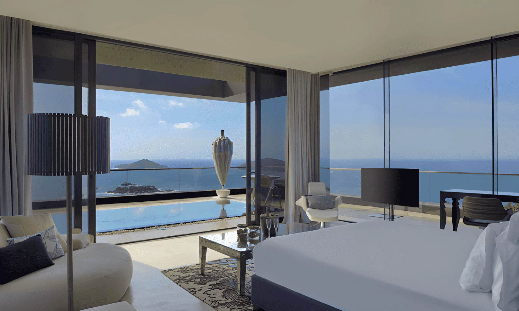 Luxury suite bedroom with views of the Indian Ocean, terrace with private pool.