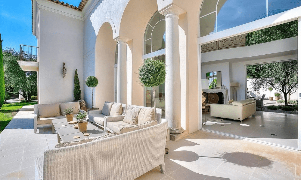 Outdoor seating area overlooking Provence hills and skies
