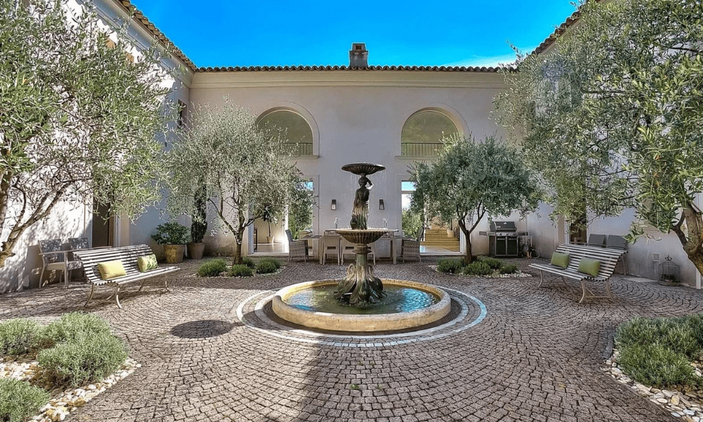 Villa terrace with seating and views over Provence hills