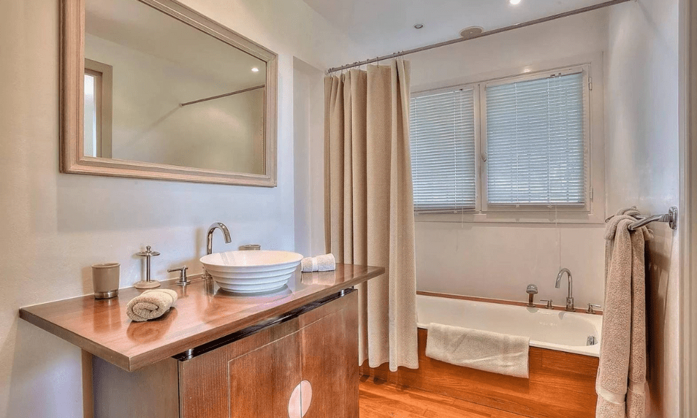 Spa-style bathroom with marble features and elegant design