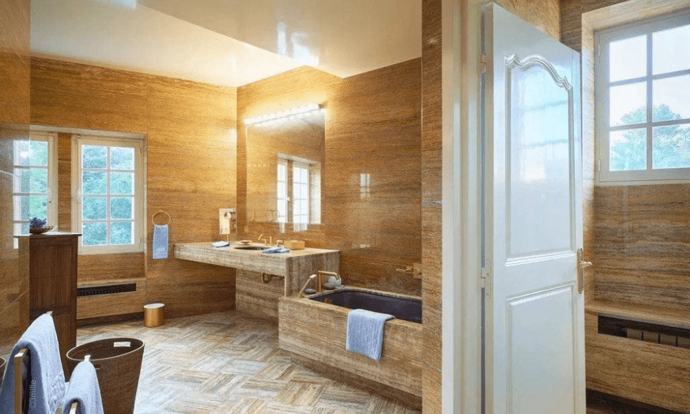 Spa style bathroom with glass shower and premium finishes