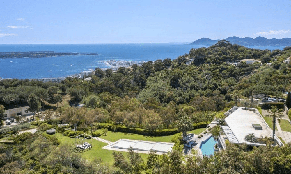Poolside sun loungers beside crystal-clear infinity-edge water